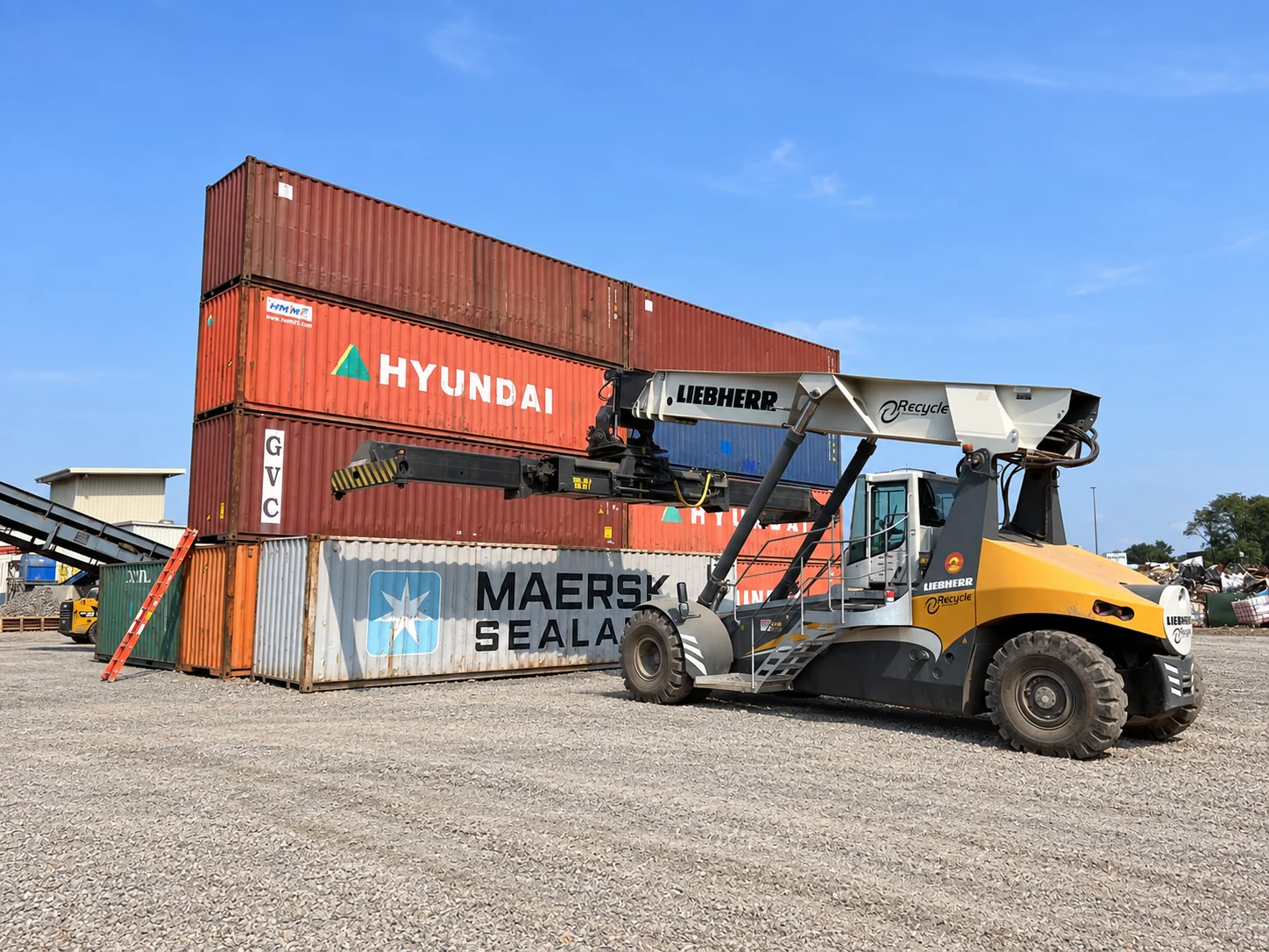 Liebherr reach stacker in front of stacked shipping containers